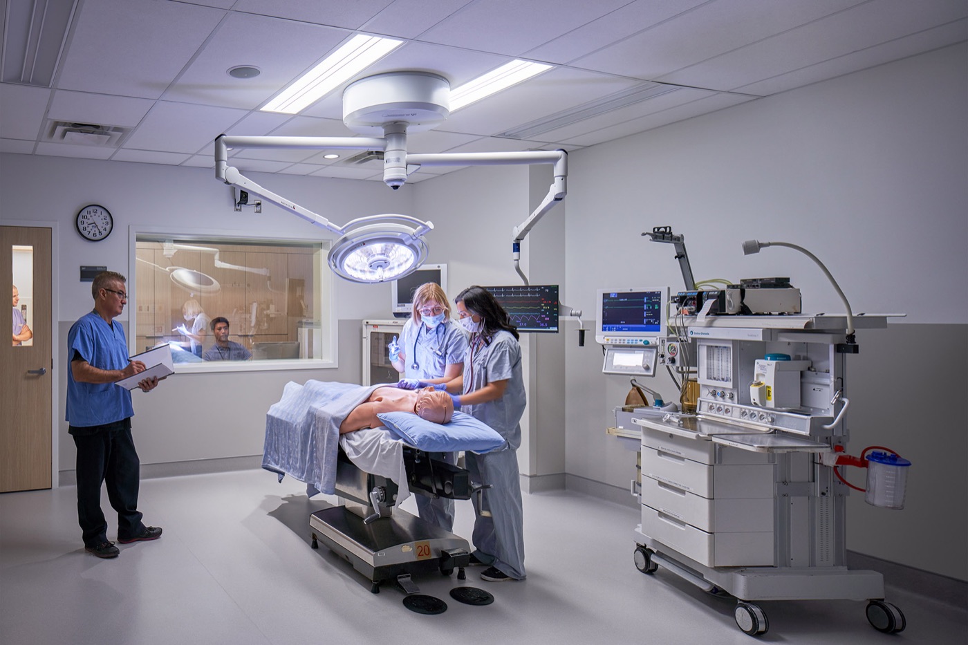 Clinical team training on a patient simulator in a hospital simulation suite
