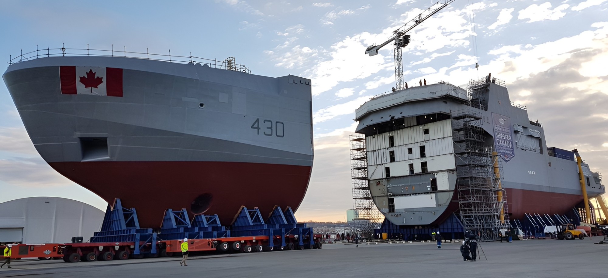 Canadian naval ship hull sections under construction at a shipyard