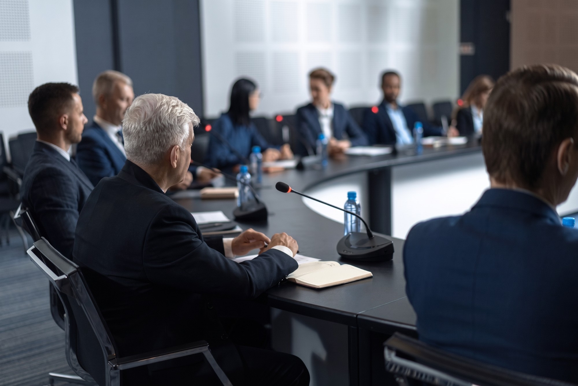 Advisory team in session around a conference table